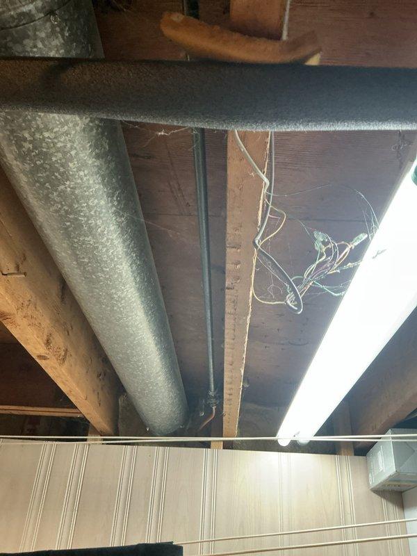 Responded to gas odor complaint following recent appliance connector installation. Conducted thorough inspection of gas lines, connections, and recently installed components in basement utility area. Performed leak detection testing using combustible gas indicator on all accessible gas piping, joints, and the new appliance connector. No active gas leaks detected at time of inspection. Verified all connections were properly tightened and sealed. Inspected exposed infrastructure including HVAC ductwork and surrounding areas for any potential safety concerns. Confirmed system integrity and safe operation of all gas appliances.