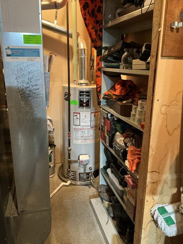 Responded to service call for water heater that would not light. Upon arrival, inspected water heater unit located in basement mechanical room. Performed diagnostic testing of ignition system, gas supply, and pilot assembly. Identified faulty thermocouple preventing pilot flame from staying lit. Replaced defective thermocouple with manufacturer-approved replacement part. Tested pilot ignition system and verified proper flame detection. Restored gas supply and successfully lit pilot light. Confirmed main burner ignition and proper heating cycle operation. Verified all safety controls functioning correctly before returning unit to service.