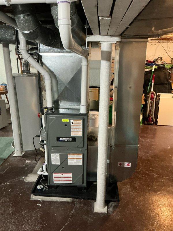 Completed comprehensive air conditioning estimate for club member at residential property. Evaluated existing HVAC system in basement mechanical room, including furnace unit with associated ductwork and PVC venting, and documented equipment specifications and installation conditions through detailed photography. Customer provided free upgrade opportunity and indicated decision timeline extending beyond early April.
