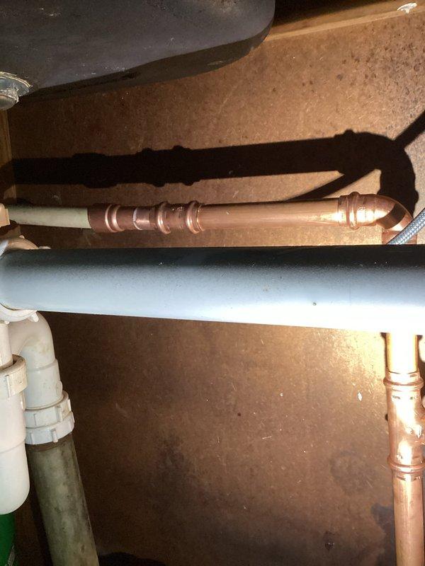 Responded to under-sink plumbing leak and performed necessary repairs. Replaced deteriorated copper pipe sections and compression fittings, installed new brass connections, and applied expanding foam insulation around pipe joints to prevent future moisture issues. All connections were tested for leaks and system restored to full functionality.