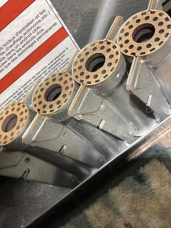 Completed annual heating maintenance and furnace tune-up on residential HVAC system. Performed comprehensive inspection of gas burner assembly, confirmed proper operation of all four burners with uniform flame pattern and verified orifice condition. Inspected condensate drainage system including pump operation and drain pan, noted standing water present in collection tray with pump functioning as designed. Verified humidifier remains deactivated per customer preference under club membership agreement. System operational and ready for heating season.