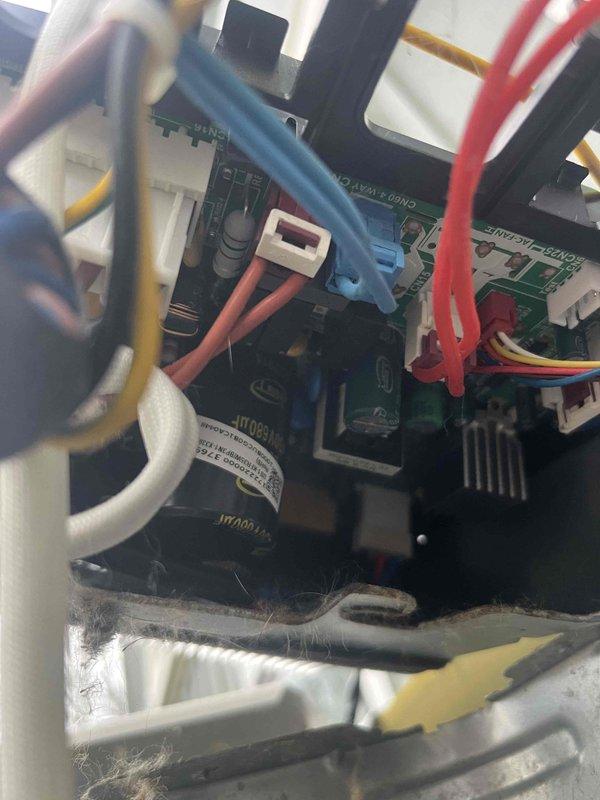 Responded to service call for 3-year-old Carrier mini-split system with reported AC malfunction during scheduled maintenance tune-up. Upon inspection, discovered extensive accumulation of dirt, dust, lint, and organic debris throughout lower interior compartment of outdoor unit, severely restricting airflow and impacting system performance. Removed and cleaned debris from unit housing, electrical components, and surrounding areas. Inspected control board, wiring connections, contactors, and refrigerant lines for damage or deterioration caused by contamination. Verified all electrical connections secure and functioning properly. Cleaned condenser coil and internal components to restore proper heat exchange capabilities. Tested system operation and confirmed AC functionality restored. Discussed humidity control settings and proper system operation with client as requested for optimal comfort management.
