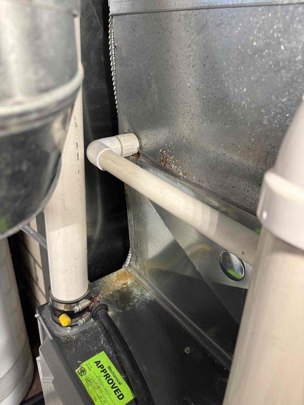 Completed annual cooling maintenance on 2021 ICP system. Performed comprehensive tune-up including inspection of condensate pump and drain pan assembly, verified proper operation of condensate drainage system with PVC drain line and fittings, and inspected HVAC ductwork components. All equipment found operating within normal parameters with approved system components properly installed and functioning.