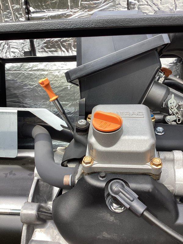 Completed comprehensive generator tune-up service on HVAC unit including inspection of compressor, refrigerant lines, and associated components. All systems verified operational with proper connections, insulation intact, and equipment showing good overall condition with no leaks or mechanical issues detected.