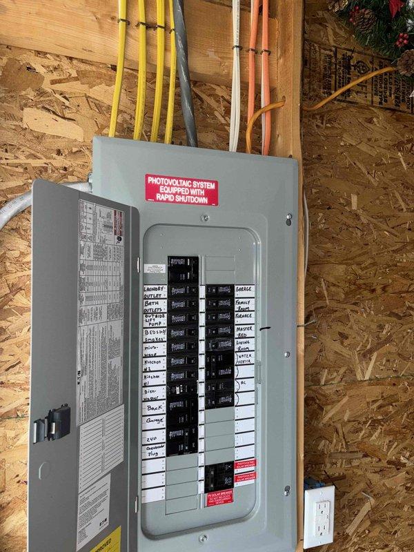 Responded to call regarding water heater not maintaining adequate hot water supply with suspected thermostat failure on 7-year-old unit. Upon arrival, performed diagnostic inspection of water heater system including visual examination of unit condition, electrical connections, and control components. Inspected electrical panel supplying power to water heater and verified proper circuit operation. Examined water heater insulation, piping connections, heating elements, and thermostat controls. Documented equipment condition and installation configuration with photographs for service records. Evaluated overall system performance and identified potential causes for inadequate hot water production.