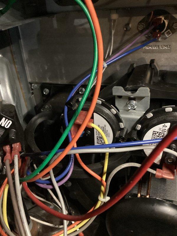 Responded to no-heat call on EnergiAir furnace displaying three-light fault code. Upon arrival, confirmed unit would not ignite despite homeowner's previous troubleshooting of air filter, exhaust venting, and power cycling. Accessed control compartment and inspected electrical connections, gas valve assembly, and pressure switch wiring. Diagnosed failed pressure switch preventing ignition sequence from completing. Replaced defective pressure switch, verified proper electrical connections to control board, and tested all safety interlocks. Cycled unit through multiple heating cycles to confirm proper ignition, flame sensing, and normal operation. System now heating normally with no fault codes present.