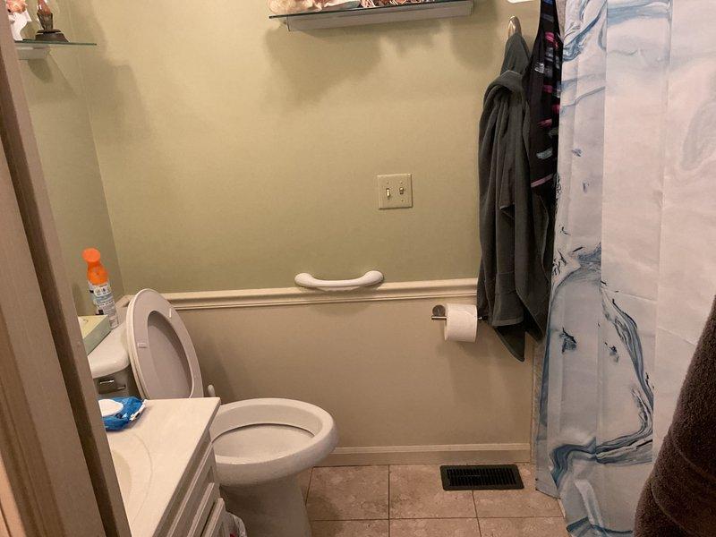 Responded to customer request for bidet toilet installation quote. Conducted on-site assessment of existing bathroom plumbing configuration, photographed current two-piece toilet with wall-mounted tank, chrome angle stop valve, and braided stainless steel supply line. Evaluated bathroom layout, fixture placement, and existing water supply connections to determine feasibility and provide accurate estimate for bidet toilet replacement.