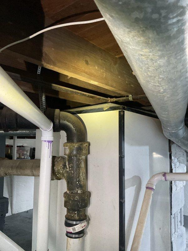 Responded to no hot water complaint at residential property. Upon inspection, found water heater over 10 years old with significant corrosion visible on connecting pipes and fittings. Documented existing conditions including corroded piping sections showing greenish-brown patina buildup and deteriorated connections. Customer elected to enroll in club membership and proceeded with replacement of one furnace and one air conditioning unit in addition to addressing the water heater concern.