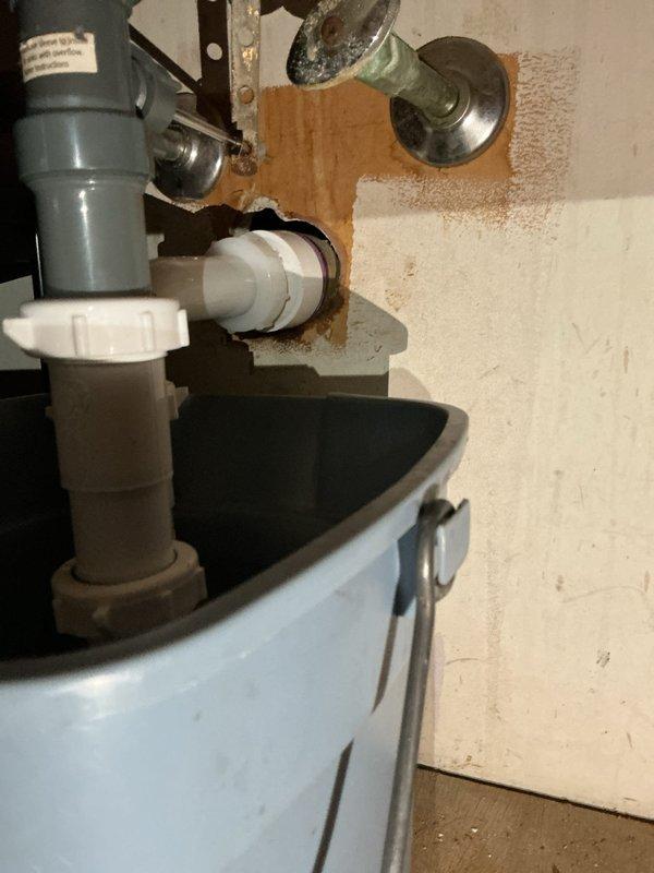 Responded to plumbing leak service call to inspect water heater and bathroom sink. Inspected water heater installation including top connections, pressure relief valve, and supply lines for proper operation and signs of deterioration. Examined anode rod condition to assess tank corrosion protection. Investigated bathroom sink leak, inspecting P-trap assembly, drain connections, garbage disposal mounting, and supply line fittings. Identified source of slow leak at sink drain connections. Tightened drain fittings and verified proper seal on P-trap. Confirmed water heater components functioning properly with no immediate concerns noted. Tested all connections for leaks and verified proper drainage. System operating as intended upon completion.
