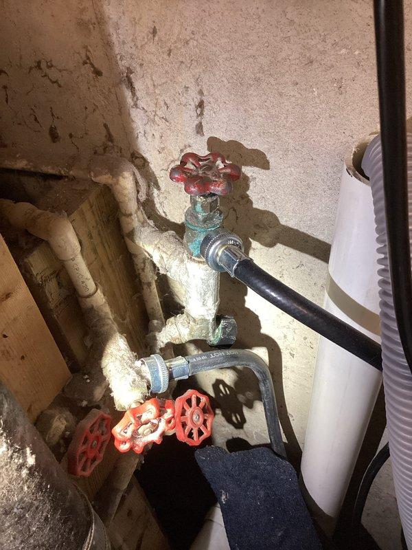 Removed two unused leaky faucets from the plumbing system and capped off the supply lines. Installed a new water line with shutoff valves for ice machine hookup, ensuring proper connection and testing for leaks. All work completed in a 76-year-old home with no additional plumbing issues identified during service.