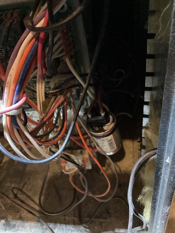 Completed annual heating and cooling tune-up on 15-year-old system. Performed comprehensive maintenance on both furnace and air conditioning unit, including inspection of electrical components, capacitor, heating elements, and wiring connections. Replaced drip pan on air conditioning unit as requested in preparation for home sale. System operating within normal parameters. No humidifier present on system. All components tested and confirmed functional.