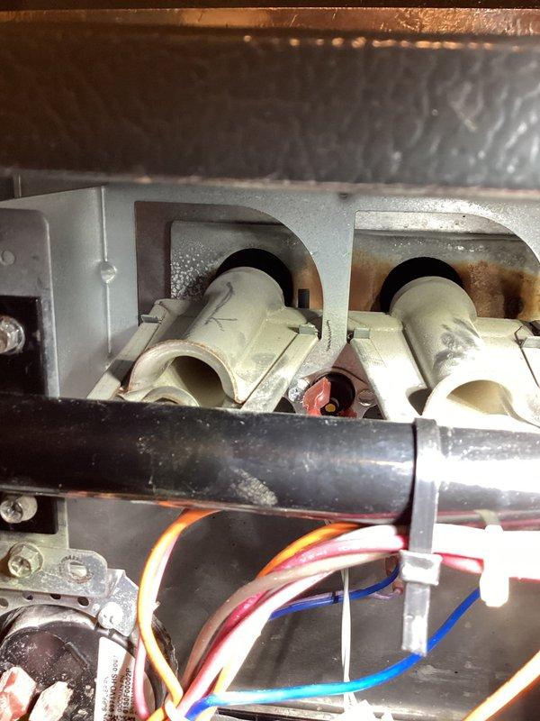 Completed annual heating and cooling tune-up on 15-year-old system. Performed comprehensive maintenance on both furnace and air conditioning unit, including inspection of electrical components, capacitor, heating elements, and wiring connections. Replaced drip pan on air conditioning unit as requested in preparation for home sale. System operating within normal parameters. No humidifier present on system. All components tested and confirmed functional.