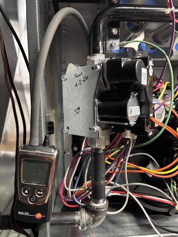 Responded to no heat and no hot water call for residential water heater. Upon arrival, performed diagnostic testing on natural gas water heater (Model XC4016FA04801, manufactured September 2019). Used Testo 510 diagnostic equipment to test gas valve and control components. Inspected electrical connections, capacitors, and wiring harness for proper operation. Verified gas supply pressure and burner assembly function. Unit restored to proper operation with heat and hot water functioning normally.