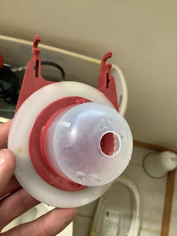 Responded to a toilet that was continuously running and had a leaking shut-off valve. Upon inspection, removed the tank lid and diagnosed a failed flush valve assembly. Replaced the defective flush valve component, which included the flapper mechanism and overflow tube assembly. Tested the toilet for proper operation and verified that the running condition was resolved and the tank was filling and shutting off correctly.
