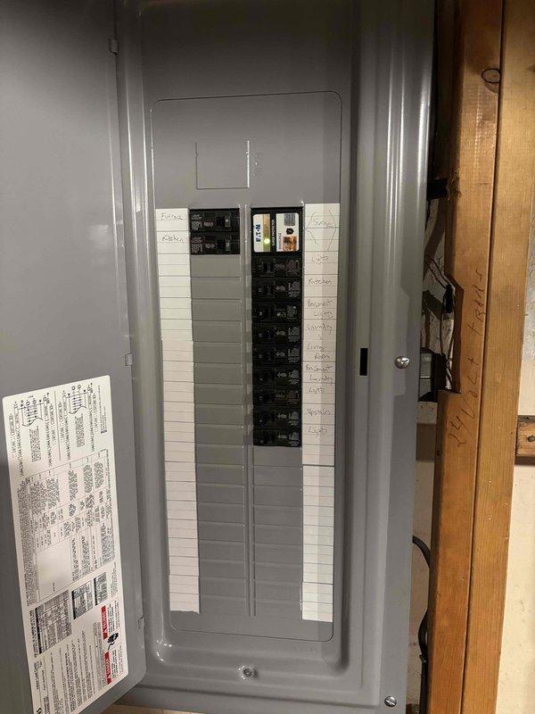 Completed inspector-required corrections on residential sub panel installation. Properly labeled all circuit breakers with handwritten identification tags indicating the function and location of each circuit. Organized and affixed circuit directory labels to panel door in systematic arrangement corresponding to breaker positions. Ensured all labeling meets code requirements for clear circuit identification and panel documentation.