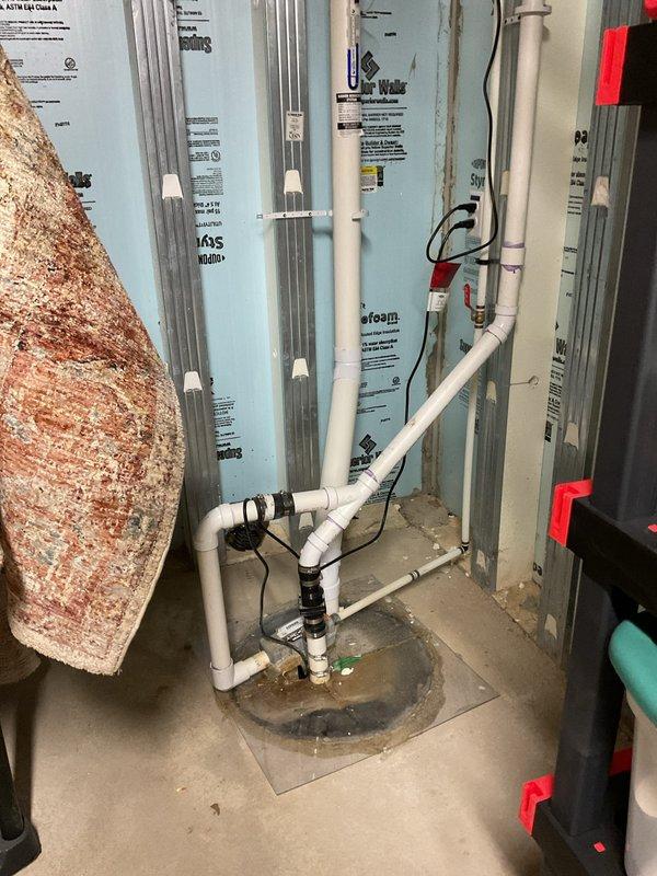 Responded to customer concern regarding basement water intrusion during recent heavy rainfall and sump pump capacity evaluation. Inspected existing sump pump system and discharge piping configuration in basement utility area. Assessed current pump performance capabilities and discussed options for enhanced water management, including potential system upgrade or battery backup installation to prevent future flooding issues during power outages or periods of excessive water volume.