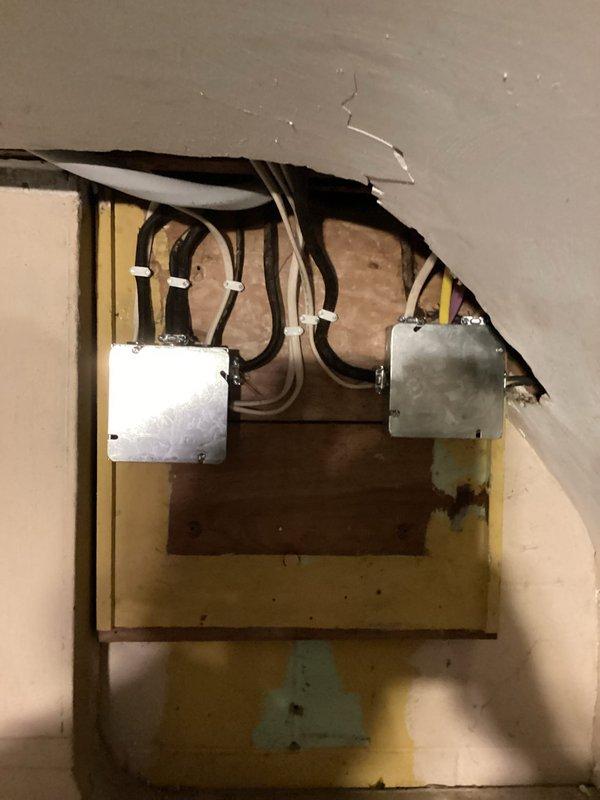 Completed inspector-requested corrections for code compliance. Addressed electrical panel labeling and accessibility issues by ensuring all circuit breakers were properly identified and panel door operated correctly. Performed corrections to exposed electrical junction boxes in wall cavity, securing wiring connections and ensuring proper box mounting to structural framing members. All electrical work completed to meet current inspection standards and building code requirements.