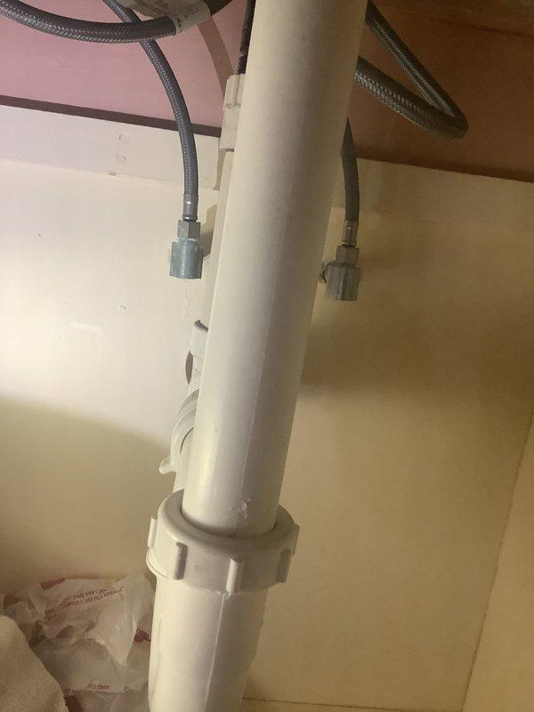 Responded to service call for malfunctioning shower head diverter. Upon inspection, assessed bathroom plumbing fixtures and determined replacement of bathroom faucet and vanity was needed. Completed installation of new supply lines and drain connections, ensuring all fittings were properly secured and leak-free.