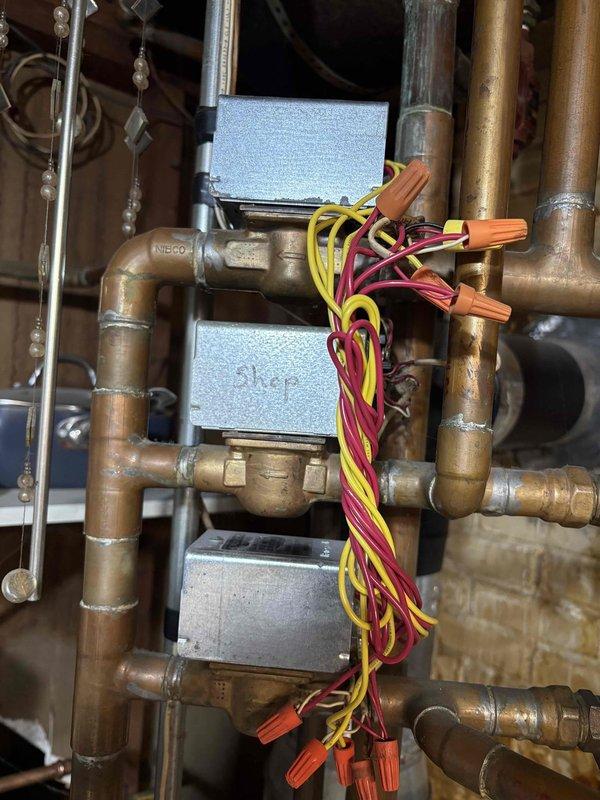 Responded to customer concern regarding high energy and gas bills potentially related to 12-year-old furnace performance. Performed comprehensive diagnostic inspection of heating system and related mechanical components. Evaluated hydronic heating system including zone valves, circulator pumps, and associated piping network. Inspected electrical connections and wiring throughout the system for proper operation and safety. Assessed furnace unit, pressure readings, and expansion tank configuration. Documented system conditions with photographs for record-keeping purposes. Provided customer with findings and recommendations for addressing energy efficiency concerns.