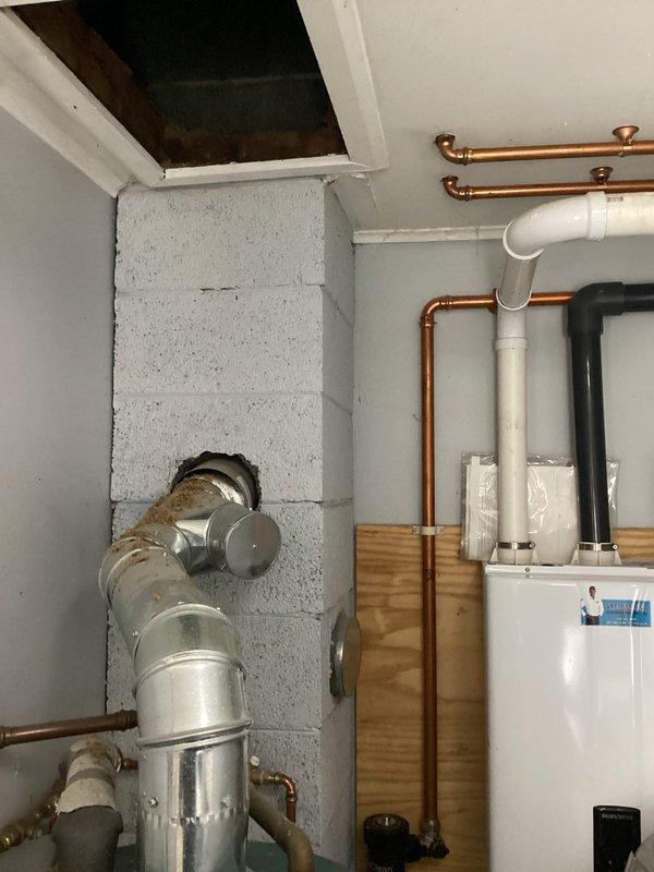 Completed warranty venting repair for HVAC system. Addressed improper venting configuration in attic space by installing new PVC vent piping with proper fittings and connections. Corrected exhaust ventilation routing from mechanical room through attic space, ensuring proper pitch and secure mounting of all vent pipes to meet code requirements and manufacturer specifications.