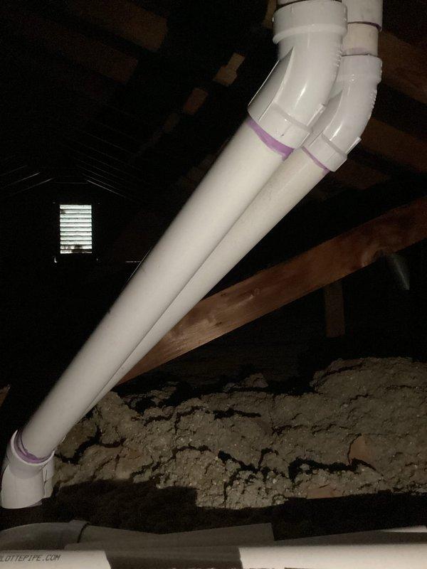 Completed warranty venting repair for HVAC system. Addressed improper venting configuration in attic space by installing new PVC vent piping with proper fittings and connections. Corrected exhaust ventilation routing from mechanical room through attic space, ensuring proper pitch and secure mounting of all vent pipes to meet code requirements and manufacturer specifications.