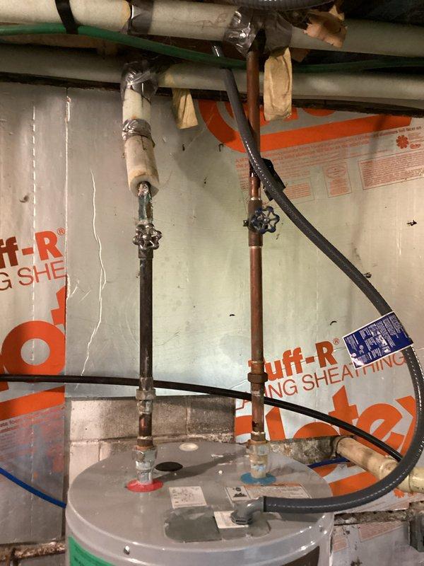 Responded to callback for water heater producing scalding hot water following previous service visit. Inspected 2-year-old A.O. Smith water heater and associated plumbing connections. Diagnosed temperature control issue and adjusted thermostat settings to manufacturer specifications. Verified proper operation of temperature and pressure relief valve. Tested hot water output at multiple fixtures to confirm safe operating temperature restored. System now functioning within normal parameters.