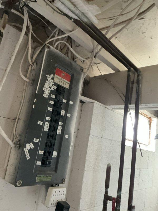 Responded to service call for water softener continuously filling with water in 1960s-era home. Upon arrival, accessed basement through unlocked front door per customer instructions. Located unit beneath electrical panel on back wall as directed. Conducted diagnostic inspection of water softener system, checking float assembly, brine tank water level, control valve operation, and inlet water flow. Photographed equipment and surrounding area for documentation purposes. Identified malfunction causing improper fill cycle that had persisted for 2-3 weeks. Performed necessary repairs to restore proper water softener operation and prevent continued overfilling condition.