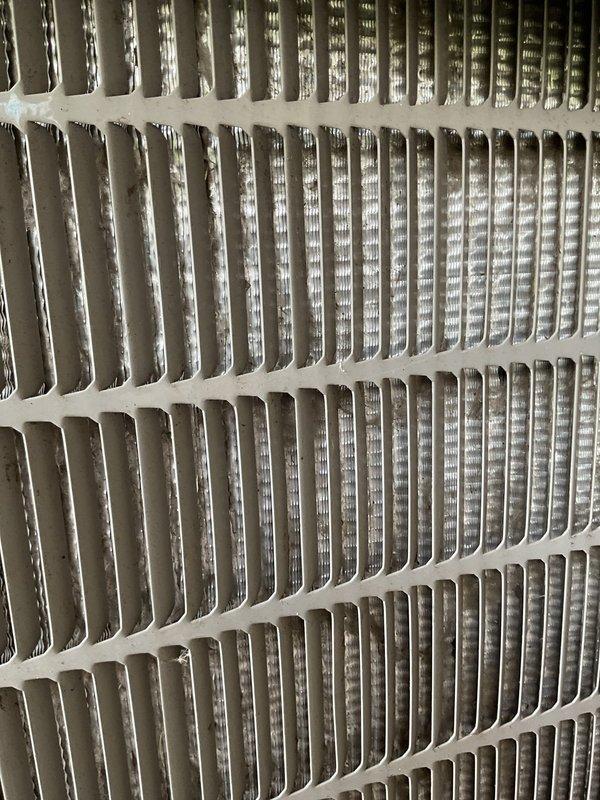 Completed annual cooling maintenance on 15-year-old Bryant air conditioning system. Performed comprehensive tune-up including inspection of outdoor condensing unit and evaporator coil assembly, verified all components operating within normal parameters, and documented equipment condition with photographic records showing clean coil fins and properly maintained exterior unit.