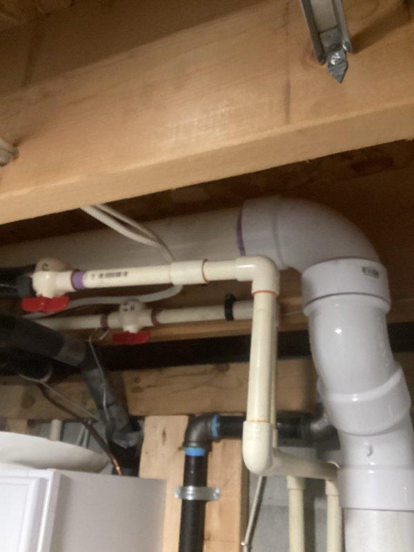 Completed comprehensive tune-up service on a 7-year-old STATE tankless water heater, including descaling, filter cleaning, and system performance verification. Inspected all plumbing connections and shut-off valves in the installation area, confirming proper operation and no leaks detected. Unit is operating within manufacturer specifications and ready for continued service.