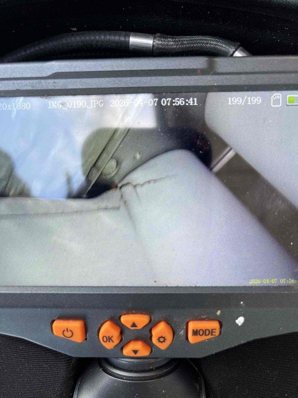 Responded to no heat call on 10-year-old furnace system. Performed diagnostic inspection using borescope camera to examine internal ductwork and heat exchanger components for cracks, blockages, or deterioration. Conducted visual inspection of confined mechanical spaces to identify root cause of heating failure and determine necessary repairs.