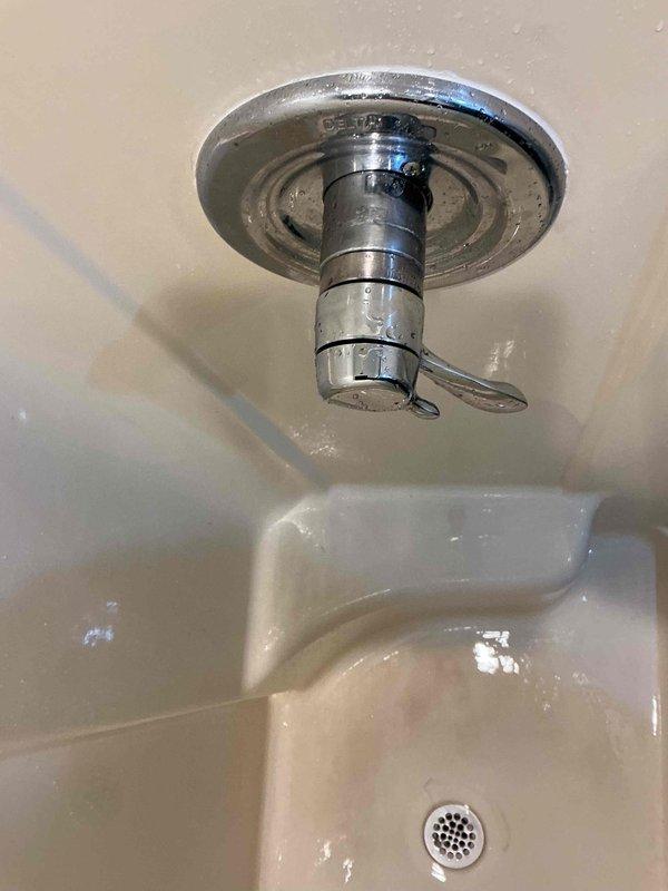 Responded to service call for non-functioning shower heads. Upon inspection, identified issues with overhead shower fixture assembly including improper water flow and potential obstruction in the shower arm. Serviced the chrome-finished ceiling-mounted shower head, addressing the water delivery system and ensuring proper operation of the fixture and its components.