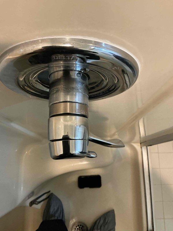 Responded to service call for non-functioning shower heads. Upon inspection, identified issues with overhead shower fixture assembly including improper water flow and potential obstruction in the shower arm. Serviced the chrome-finished ceiling-mounted shower head, addressing the water delivery system and ensuring proper operation of the fixture and its components.