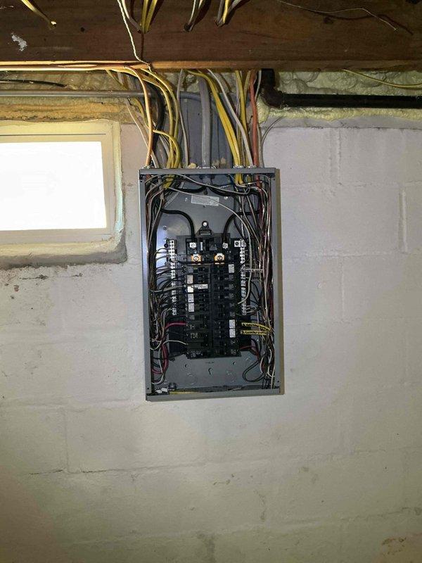 Responded to service call for power outage affecting approximately half of the electrical outlets in the residence. Upon arrival, inspected the main electrical panel and identified tripped circuit breakers following the power outage event. Reset affected breakers, restored power to all previously non-functioning outlets, and verified proper operation throughout the home. Confirmed all circuits were functioning correctly and panel connections were secure before completing the service call.