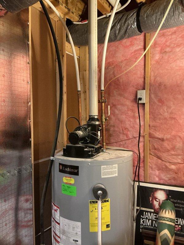 Responded to service call for 10-year-old Lochinvar water heater displaying low flame signal error code. Diagnosed and resolved the flame sensor issue, verified proper combustion and gas flow, and tested unit operation to ensure error code was cleared and hot water production restored to normal function.