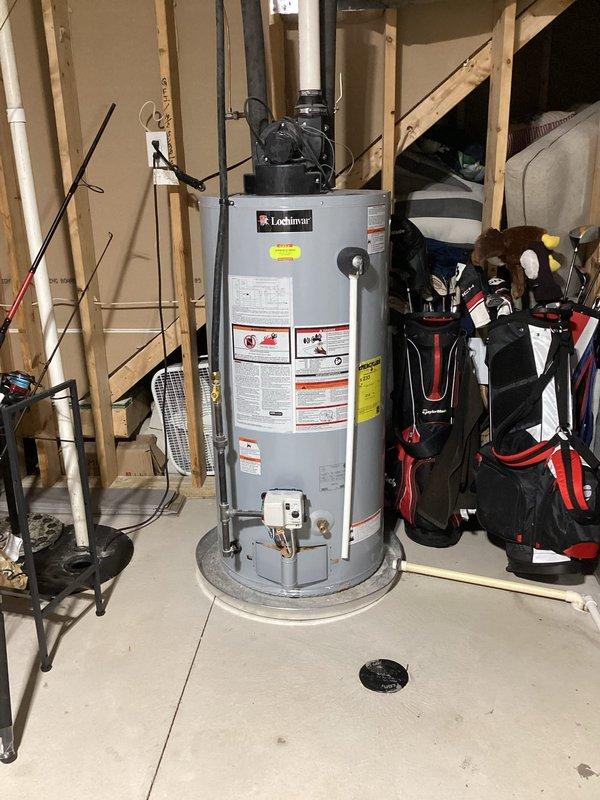 Responded to service call for 9-year-old Lochinvar water heater not reaching proper temperature. Upon arrival, inspected unit and verified operational status of heating elements, thermostat settings, and electrical connections. Documented existing installation conditions including plumbing connections, venting system, and safety devices. Unit found to be functioning within normal parameters after inspection and minor adjustments to temperature controls. Verified proper operation and adequate hot water delivery before completing service call.