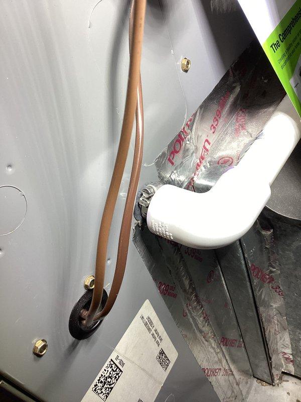 Responded to water leak service call for 13-year-old International Comfort Products heating system. Located and addressed condensate line leak while system remained operational. Inspected condensate drainage components, documented equipment condition with photos, and verified heating system continued to function properly throughout service visit.