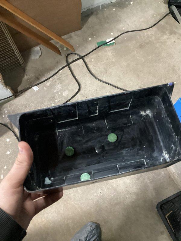 Completed annual cooling maintenance on EnergiAir system per 3-year service agreement. Inspected and photographed moderately soiled air filter showing accumulated dust and debris, indicating normal system operation since last service. Checked condensate drain pan for proper drainage and debris accumulation, finding unit in satisfactory operating condition with no immediate service needs identified.