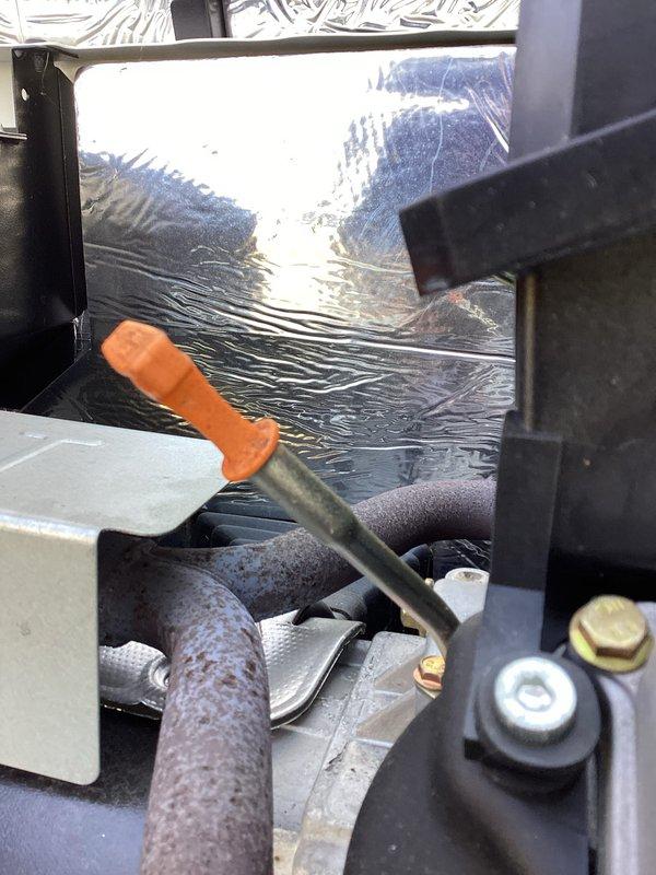 Responded to service call for 10-year-old Generac generator displaying error code 1505. Upon arrival, performed diagnostic inspection of the unit housed in its enclosure. Accessed generator compartment and examined engine components, fuel system, and associated hardware. Inspected fuel lines, float mechanism, and connections for proper operation. Evaluated mechanical components and verified system integrity. Documented equipment condition through photographs showing generator installation, enclosure setup, and component details. Error code 1505 typically indicates a RPM sensor or speed detection issue requiring further troubleshooting of ignition system and control board connections.