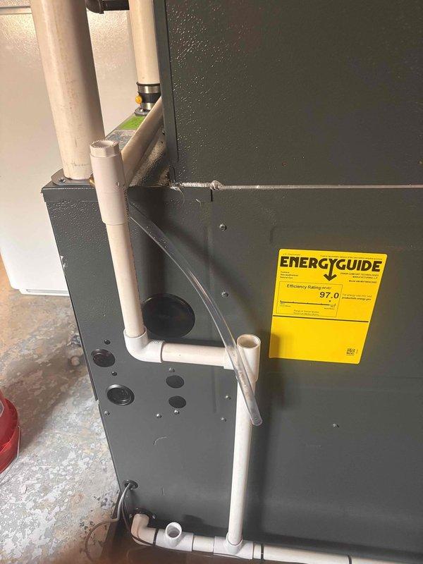 Completed annual heating maintenance on EnergiAir Elite Series high-efficiency furnace (97.0 AFUE rating). Performed comprehensive tune-up including filter inspection, burner assembly cleaning, heat exchanger examination, blower motor lubrication, and combustion analysis to ensure optimal performance for the heating season. Inspected humidifier system, verified proper PVC venting and condensate drainage, confirmed all safety controls operational, and documented equipment condition with photographs for service records.