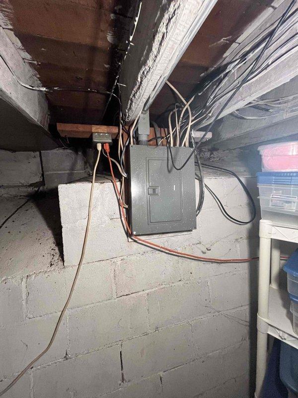 Conducted comprehensive site evaluation for furnace and air conditioning system replacement in residential property. Assessed existing electrical infrastructure, including main panel capacity and circuit availability in basement utility area, to determine compatibility with proposed HVAC equipment. Documented current installation conditions, electrical connections, and structural considerations necessary for proper equipment placement and code-compliant installation.