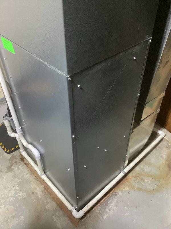 Completed annual heating tune-up on 15-year-old furnace system. Performed comprehensive inspection of air handler unit, verified proper operation of all components, checked condensate drainage system including PVC piping configuration, and documented equipment condition with photos. Unit is operating within normal parameters with no immediate service needs identified.