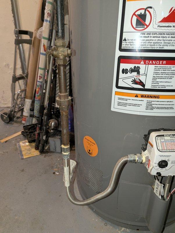 Completed on-site assessment of 40-gallon residential water heater experiencing active leakage requiring replacement. Documented existing unit installation in basement utility area, including current configuration with gas supply line, venting system, and surrounding HVAC equipment. Provided comprehensive estimate for complete water heater replacement with new 40-gallon unit.
