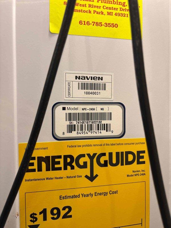 Performed tankless water heater tune-up on 7-year-old Navien NPE-240A unit. Flushed system using descaling solution to remove mineral buildup and maintain optimal heat exchanger performance, ensuring continued efficiency and reliability of the instantaneous gas water heating system.