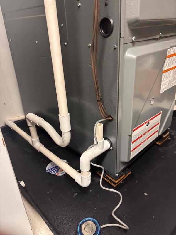 Responded to no heat call where furnace failed to start. Upon inspection, found condensate drain pan full of water, indicating a blocked condensate drain line or failed condensate pump preventing furnace operation due to safety float switch activation. Cleared condensate drain system, verified proper drainage, and restored furnace to normal operation with heat confirmed at registers.