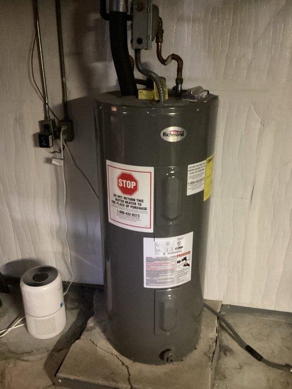 Responded to no cooling complaint on residential air conditioning system. Diagnosed faulty thermostat preventing AC unit from engaging. Replaced existing 10-year-old thermostat with new Honeywell digital programmable unit. Verified proper wiring connections, confirmed system operation in cooling mode, and tested auto fan functionality. System now operating normally with AC responding to thermostat calls.