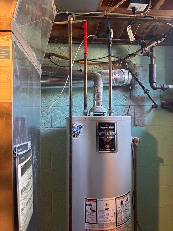 Completed annual heating and cooling maintenance on 14-year-old Carrier system. Performed furnace tune-up including inspection of burners, heat exchanger, blower assembly, and safety controls. Conducted air conditioning tune-up with refrigerant charge verification, condenser coil cleaning, and electrical connection inspection. System operating within manufacturer specifications with no humidifier present on equipment. All components tested and found functioning properly for continued reliable operation.