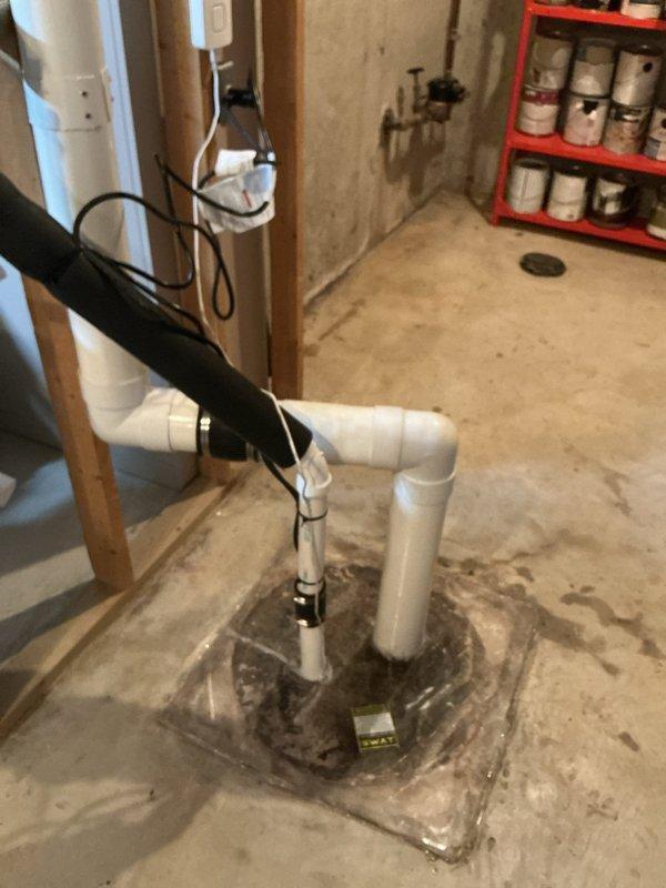 Responded to repeat service call for sump pump running continuously. Upon arrival, inspected sump pump system in basement pit and found pump motor cycling without shutting off, indicating potential float switch malfunction or debris interference. Examined PVC discharge piping assembly and verified proper installation and connections. Tested pump operation and float mechanism to diagnose cause of constant running condition. System evaluated and serviced to restore proper automatic cycling function.