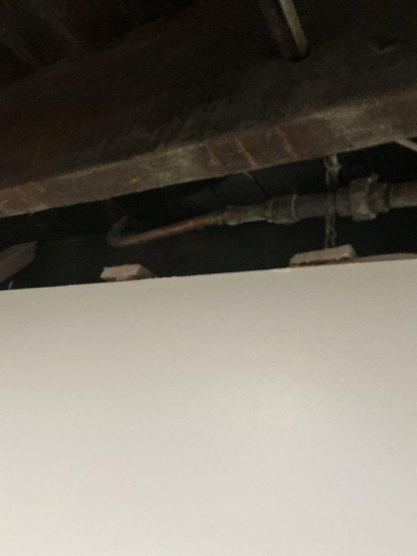 Responded to gas leak call for early availability. Located and repaired two separate gas leaks in basement piping system—one leak identified on gas line serving family room area, second leak found on gas piping behind furnace. Both leaks were addressed, tested for proper seal, and confirmed safe for continued operation.