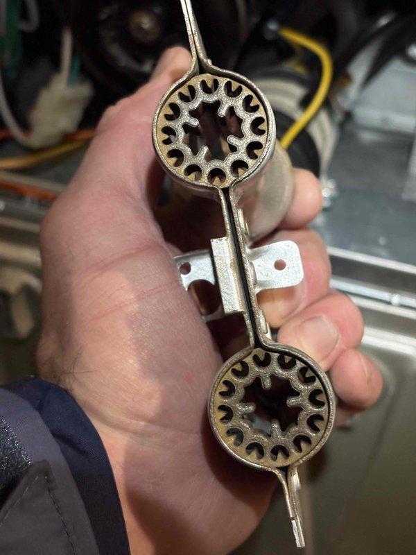 Completed annual heating maintenance on Carrier furnace system per recurring service agreement. Performed comprehensive tune-up including inspection of all major components, burner assembly, heat exchanger, and blower motor operation. Removed and inspected dual-chamber gas valve assembly, which showed normal wear patterns and oxidation consistent with six years of operation. Verified valve components, mounting brackets, and connection ports were intact and functioning properly. Reinstalled gas valve and confirmed proper operation. System tested and verified to be operating within manufacturer specifications. No humidifier present on this unit as noted. All safety controls checked and confirmed operational.