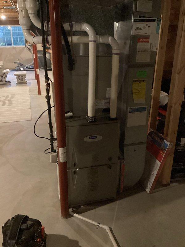 Completed annual cooling maintenance on Carrier HVAC system. Performed comprehensive tune-up inspection of furnace unit and integrated humidifier component. Verified proper operation of all system controls, electrical connections, and PVC venting configuration. Inspected gas line connections, ductwork installation, and humidifier functionality. Confirmed all manufacturer warning labels present and system operating within normal parameters. Unit tested and left in proper working condition for continued seasonal operation.